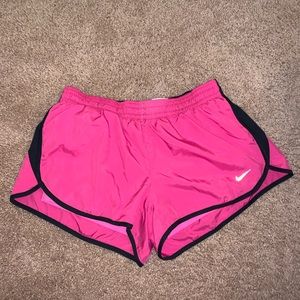 NIKE. Neon pink workout shorts.